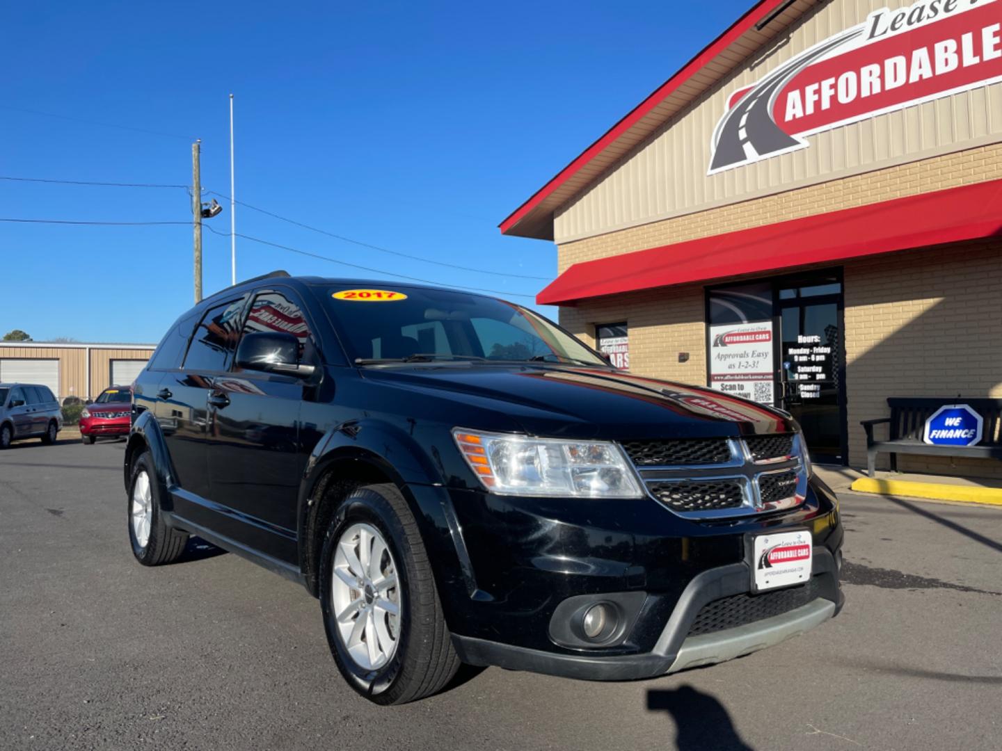 2017 Black Dodge Journey (3C4PDCBGXHT) with an V6, 3.6 Liter engine, Auto, 6-Spd AutoStick transmission, located at 8008 Warden Rd, Sherwood, AR, 72120, (501) 801-6100, 34.830078, -92.186684 - Photo#1